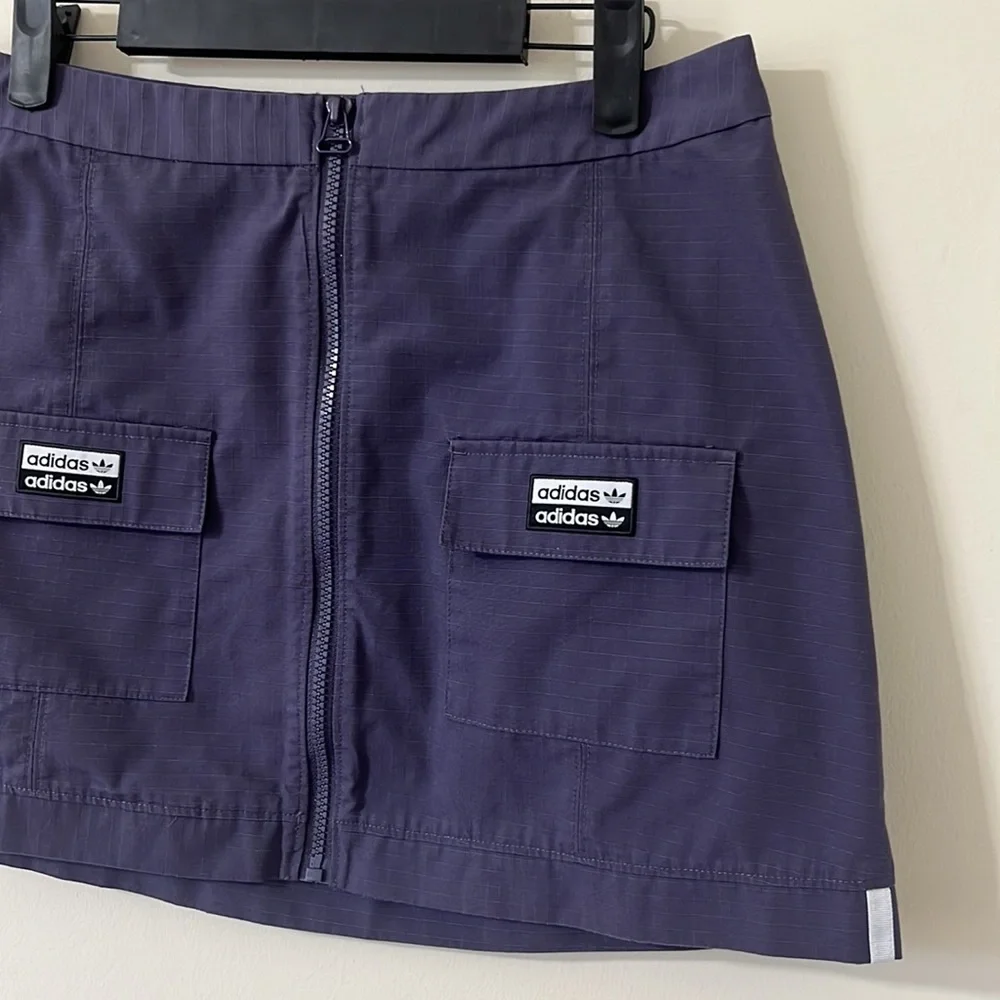 Adidas Originals Reveal Your Voice Ripstop Zip-Front Mini Skirt Purple Size M